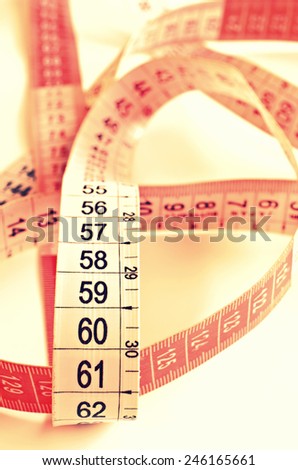 Colorful measure tape on a white background