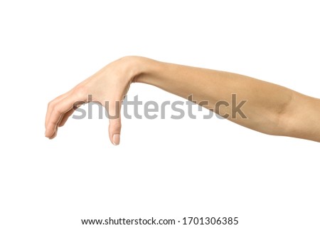 Hand picking, holding, grabbing or reaching. Woman hand with french manicure gesturing isolated on white background. Part of series 商業照片 © 