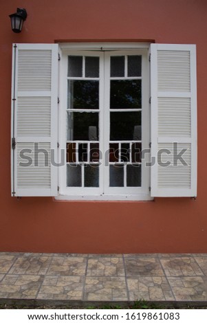 White wooden window close-up with colored glasses.n window sill, looking out. Foto stock © 