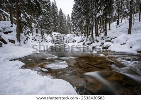 Similar – Image, Stock Photo Waterfall flowing into river in nature