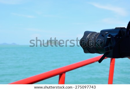 Closeup scene of camera on the boat during travel to island