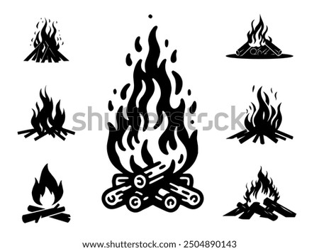 A set of silhouettes of bonfires in nature. Burning bonfires