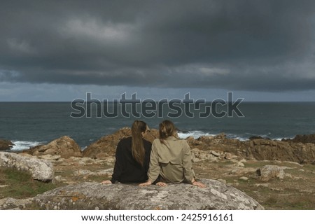 Similar – Image, Stock Photo Unrecognizable traveler with flashlight exploring foggy forest