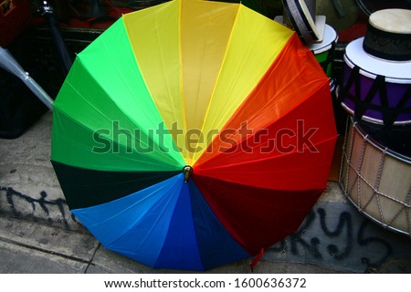 Rainbow- colored, colorful umbrella for decoration, art Stok fotoğraf © 