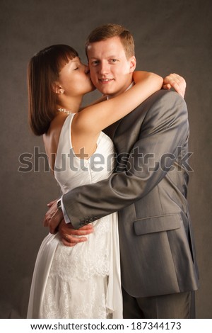Bride kisses the groom