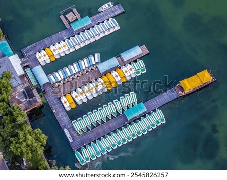 Similar – Image, Stock Photo small boats parked on the sand of a beach during sunset