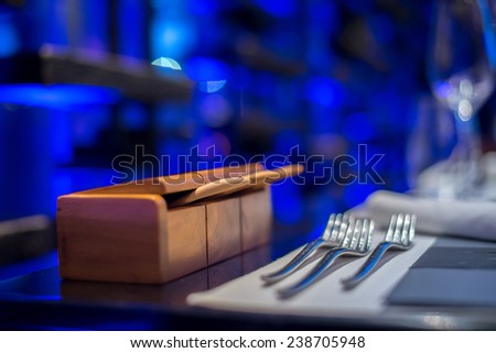 Wooden seasoning box on dining table set