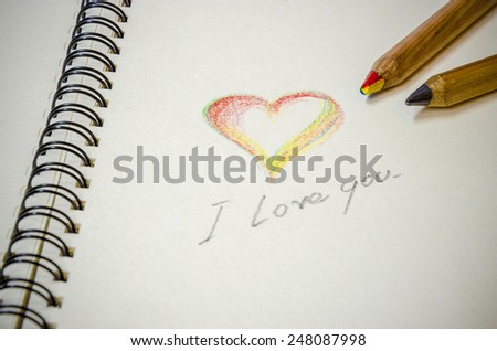 Hand writing of colorful heart and word \