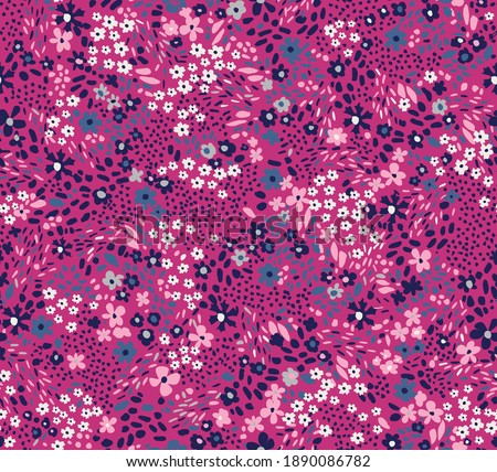 Repeatable floral pattern consisting of colorful mini flowers on pink background.