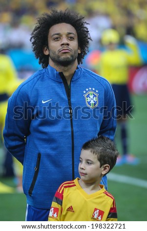 SAO PAULO, BRAZIL - June 12, 2014: Marcelo during the National Anthem at the FIFA 2014 World Cup opening game. Brazil is facing Croatia in the Group A at Corinthians Arena. No Use in Brazil.