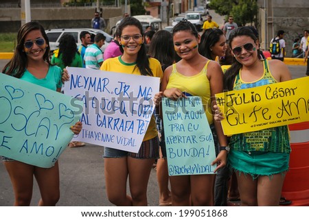 FORTALEZA, BRAZIL - June 16, 2014: Soccer fans waiting for the Brazil national team to arrive for their training at Estadio Castelao one day before Brazil faces Mexico. No Use in Brazil.