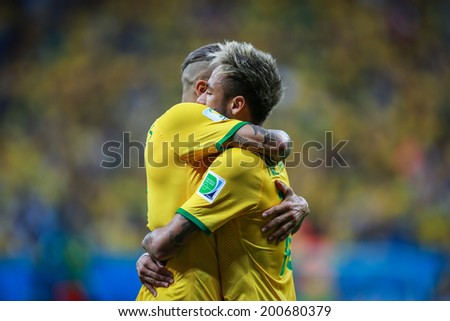 BRASILIA, BRAZIL - June 23, 2014: Neymar of Brazil celebrates after scoring a goal during the 2014 World Cup game between Brazil and Cameroon at Estadio Nacional Mane Garrincha. No Use in Brazil.