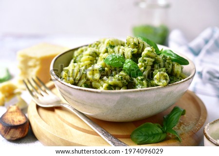 Similar – Image, Stock Photo Pasta with pesto sauce minimalist on a pink background