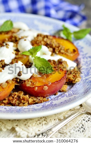 Grilled peaches with granola and whipped cream for breakfast.