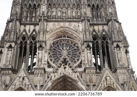 Similar – Image, Stock Photo Rose window and sculpted filigrees at the front of a gothic cathedral