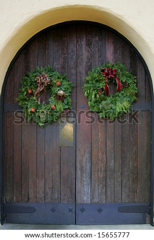 Christmas wreaths on oak front door Napa Valley California