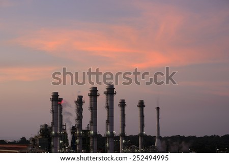 Refinery reflected light water sunset industry in thailand .