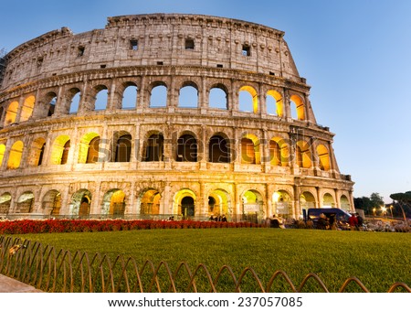 ROME - OCTOBER 31: Coliseum exterior on October 31, 2014 in Rome, Italy. The Coliseum is one of Rome\'s most popular tourist attractions with over 5 million visitors per year.