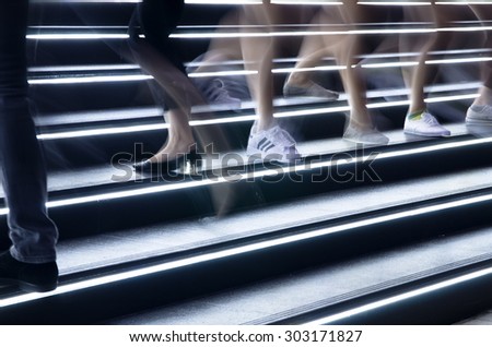 Thailand, Bangkok -July 29, 2015: fast step on illuminated stairs in the city night life on July 29,2015.