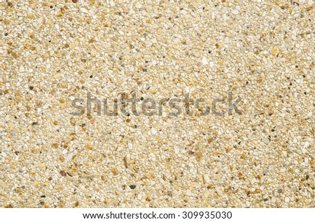 Abstract background of exposed aggregate concrete texture