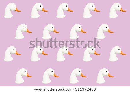 Goose head pattern isolated on light pink background. Perfect for background of greeting cards, invitations, baby shower, fabric, scrapbook, baby album.
