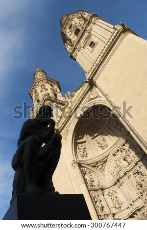 Santa Maria de la Redonda Procathedral and the silhouette of The Thinker in Logrono, La Rioja. Spain.