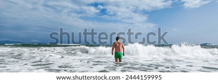 Similar – Image, Stock Photo Man standing on seaside and contemplating moment