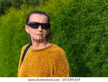 Image, Stock Photo Woman near green bushes