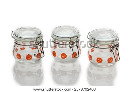 Similar – Image, Stock Photo Three glass jar container full with dried raw pasta in an empty room