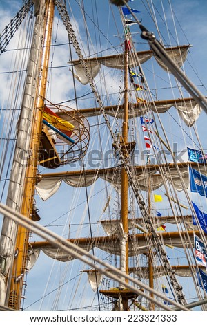 Coruna, Spain - August 12, 2012: Detail of several tall ship masts that form a dense web of ropes.