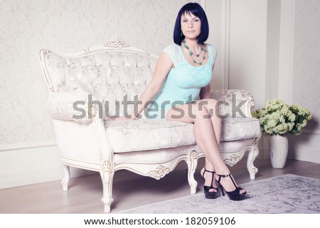 Beauty rich luxury woman on the sofa