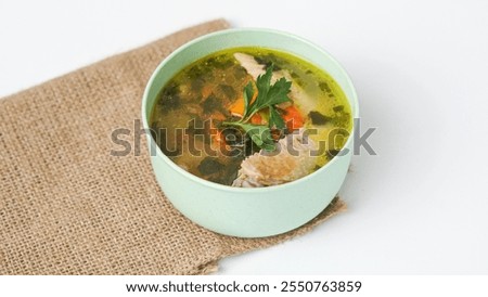 Similar – Image, Stock Photo Served chicken soup with carrot and zucchini