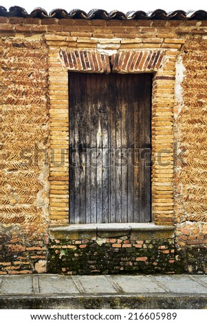 A vintage old wood wimdow on the town of Jalisco, Mexico, America