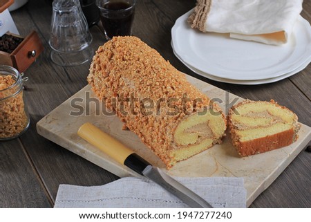 Similar – Image, Stock Photo Baked roll cake with Physalis flowers