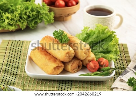  Sosis Solo or Fried Egg Crepe with Minced Beef or Chicken Filling. Popular snack from Solo Indonesia for Snack Box Zdjęcia stock © 