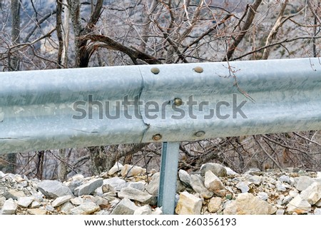 Fence on the road as prevention in case of accident