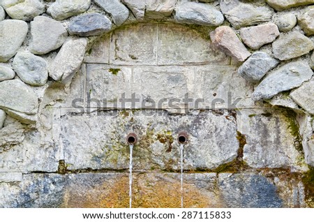 Closeup of drinking fountain with natural spring water