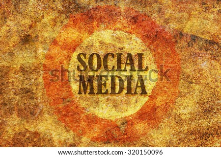 Text Social Media in the center of a bright circle on textured background
