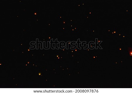 Small sparkling dots in the sky of Dieng, Central Java, Indonesia. Those dots are lanterns flown at the end of Dieng Culture Festival which is held once a year. Foto stock © 