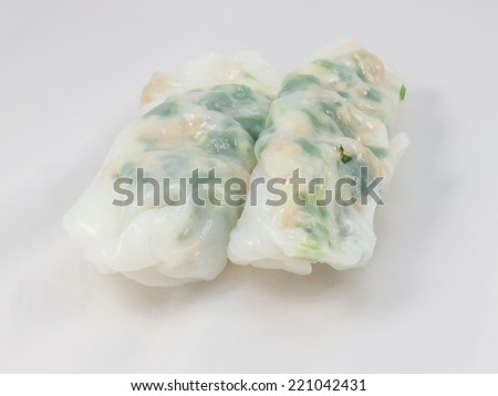 typical Vietnamese cuisine, popular dish in central area of Vietnamese, kind of rice cake with pork meatloaf and baby shrimp on white background.