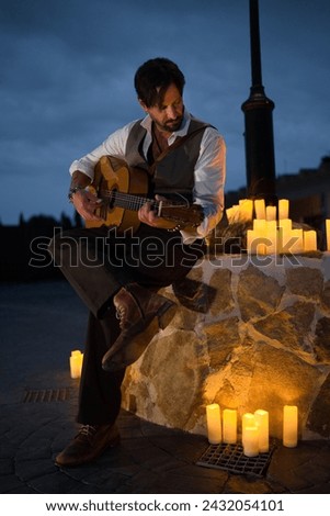 Similar – Image, Stock Photo Man playing a spanish guitar and recording with a microphone