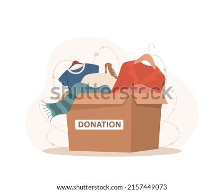 Clothes donation. Cardboard box full of different things. Volunteering and social care concept. Support for poor people. International charity day. Vector illustration in cartoon style. Foto d'archivio © 
