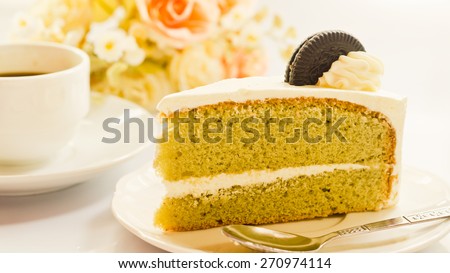 Green tea cream, vanilla cake.on white background soft focus vintage tone.