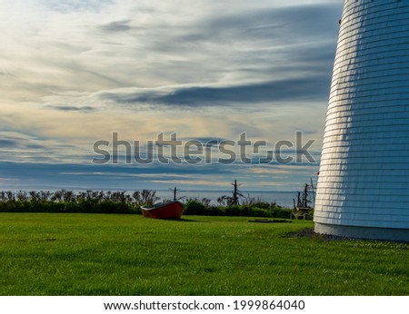 Red point next to lighthouse at point prim prince edward islad Imagine de stoc © 