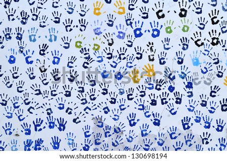 collection of colorful hand prints.