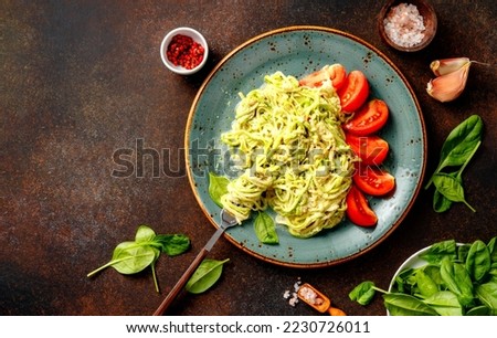 Similar – Foto Bild Hausgemachte Zucchini-Spaghetti mit Pestosauce, Brokkoli und Kirschtomaten