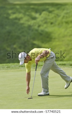 TORONTO, ONTARIO - JULY 21:English golfer Paul Casey on a green during a pro-am event at the RBC Canadian Open golf on July 21, 2010 on Toronto, Ontario.
