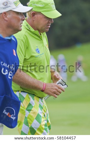 TORONTO, ONTARIO - JULY 21: US golfer John Daly during a pro-am event at the RBC Canadian Open golf, St. George\'s; Golf and Country Club;  July 21, 2010 in Toronto, Ontario