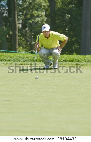 TORONTO, ONTARIO - JULY 21 : English golfer Paul Casey  lines up a putt during a pro-am event at the RBC Canadian Open golf on July 21, 2010 in Toronto, Ontario