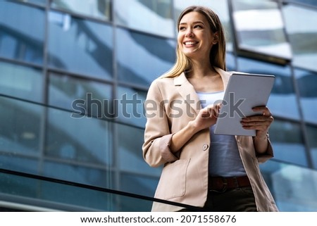 Similar – Image, Stock Photo Young Caucasian business woman with long brunette hair working on laptop in cafe. College student using technology